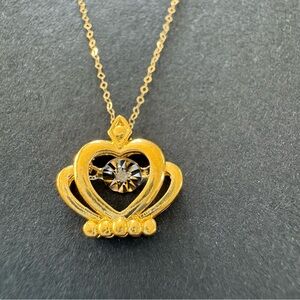 Dancing necklace. 18k yellow gold with 0.01CT diamond